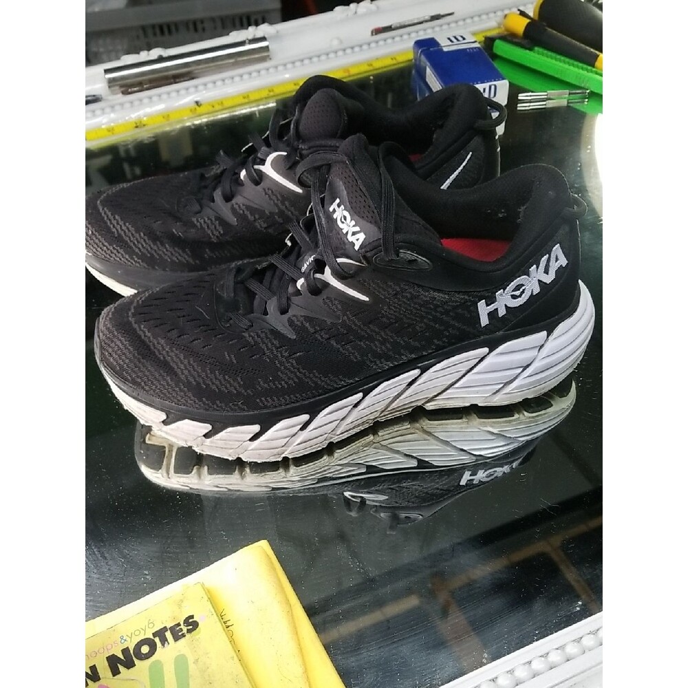 Mens 9 Hoka One One Gaviota 4 running shoes in black and white.